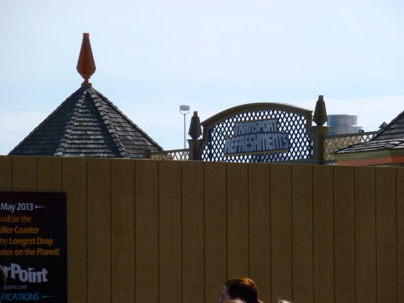 A glimpse of the Transport Refreshments stand, in September 2012, hidden from view by the construction fence.  